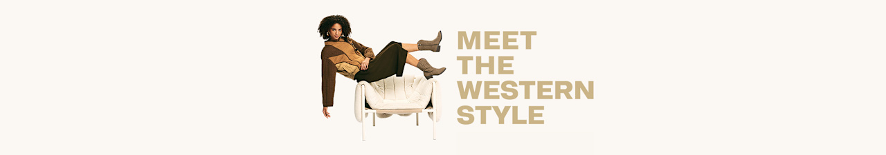 Person reclining on a white armchair in a western-inspired outfit beside the text “Meet the Western Style”.