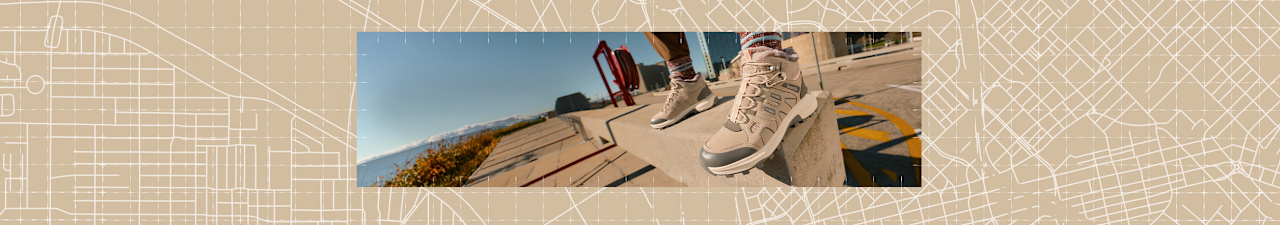 Explore Outdoor image showing a close-up of a light outdoor shoe on a city ledge.