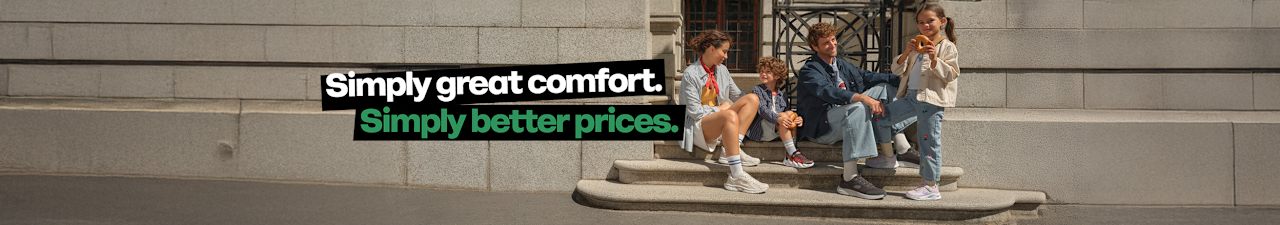 A man, a woman, a boy and a girl wearing skechers sneaker
