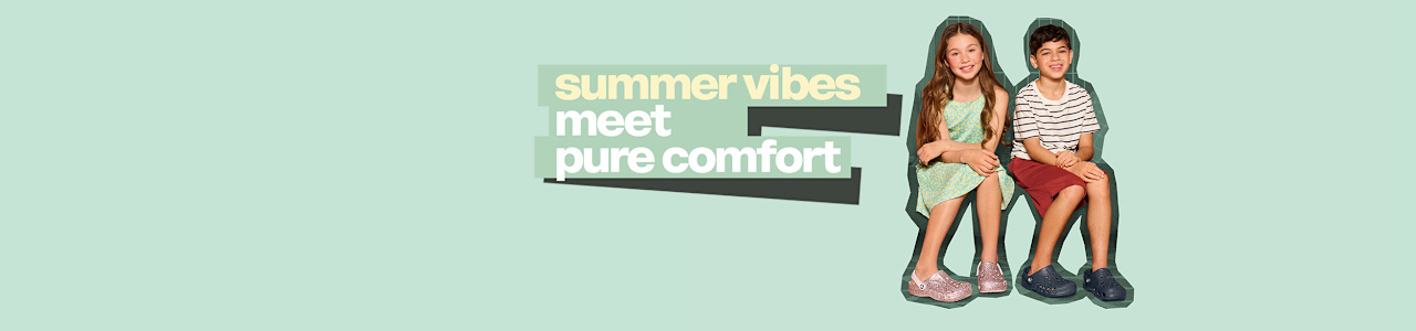 Promotional Crocs banner showing two children seated side by side wearing Crocs footwear, with the text “Summer vibes meet pure comfort” on a light green background.