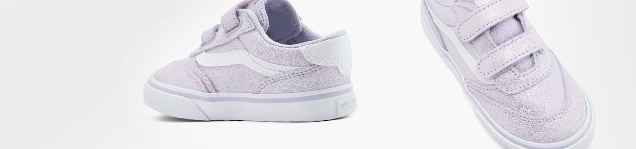 Purple vans sneakers on white background