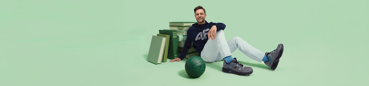 Green background and a person with sneaker