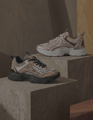 Two shoes on concrete block