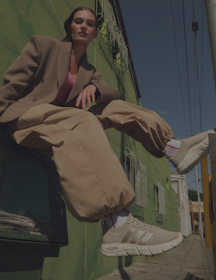 A young woman wearing sneaker