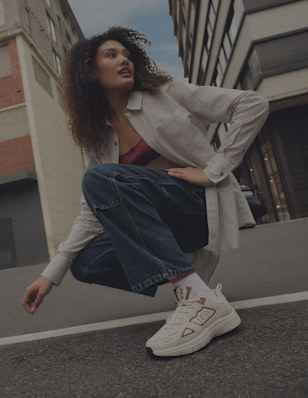 A young woman wearing sneaker