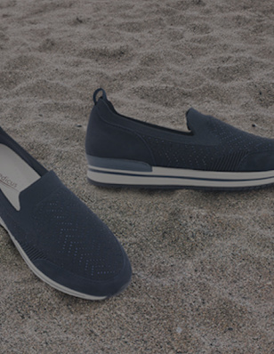 Blue shoes at the beach