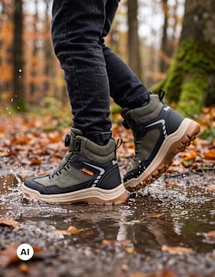 TEX Boots standing in puddle