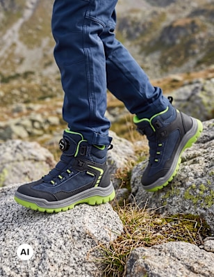 trekking boots on stones