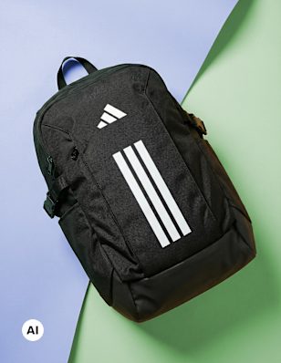 backpack on a blue and green background