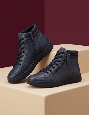 boots on a pedestal
