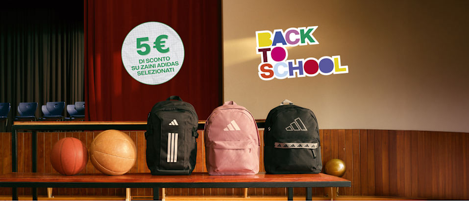 Adidas backpacks displayed with a “Back to School” sign and a promotional discount message.