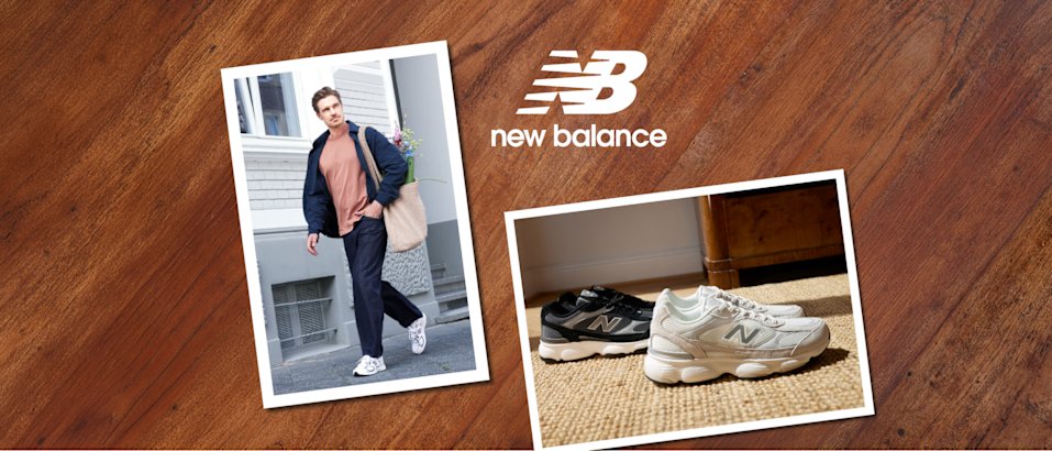 A New Balance brand composition is displayed on a warm wooden surface. Two printed photographs are arranged side by side: one shows a person walking along a city street wearing white New Balance sneakers, while the other features two sneaker styles displayed on a woven rug in a sunlit interior. The New Balance logo appears above the images, creating a clean, lifestyle-focused presentation that showcases the footwear in everyday settings.
