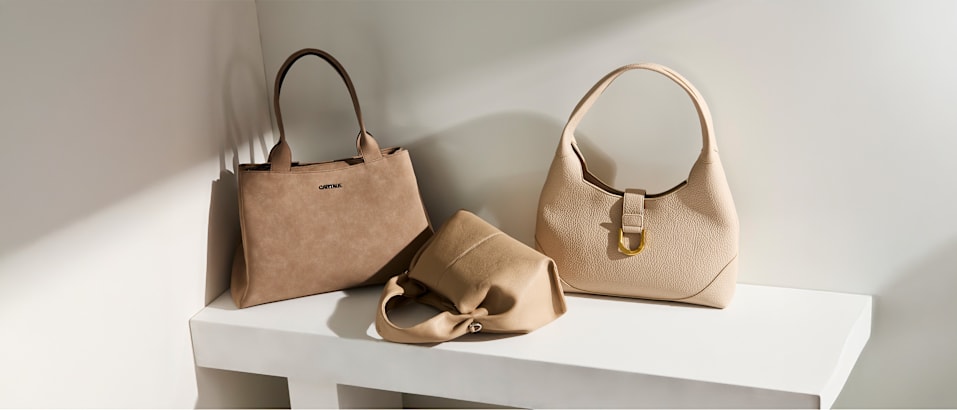 three brown bags