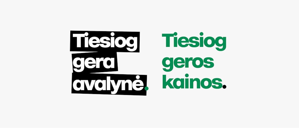 The text says “Tiesiog gera avalynė. Tiesiog geros kainos.” It is displayed on a white background with the first phrase in bold white letters inside a black text box, and the second phrase in green letters directly on the white background.
